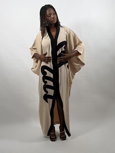 beige and black tunic