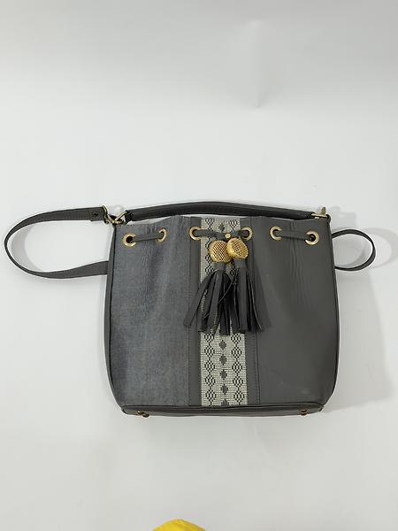 Leather bag and woven loincloth