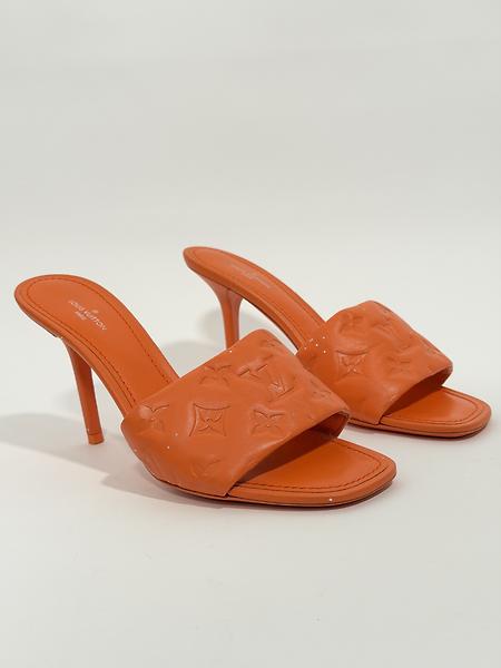 Open mules with a small heel